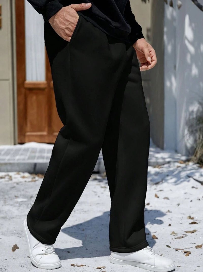 فلاينوف بنطلون رياضي رجالي أسود سادة بقصة فضفاضة - Image 2